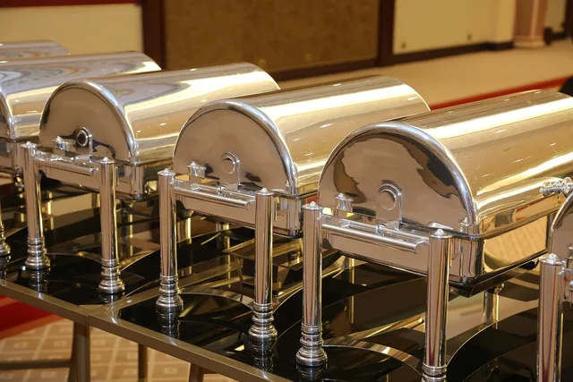 buffet, food and drink industry, dinner, outdoors, in a row, event, party - social event, breakfast, banquet, garden party, group of objects, hotel, meeting, metal, service, restaurant, blue, celebration, celebration event, brown meeting, brown party, brown group, brown conference, brown social, brown dinner, brown event, brown hotel, brown service, buffet, banquet, banquet, banquet, banquet, banquet. Corporate event planning training: what each role must know and when to run it