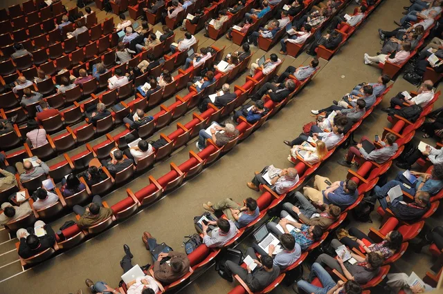 event venue, auditorium, meeting, forum, conference, listener, audience, public, people, sit, watching. Comparing event marketing benchmarks: a measurement ladder, source checks and a two-show example